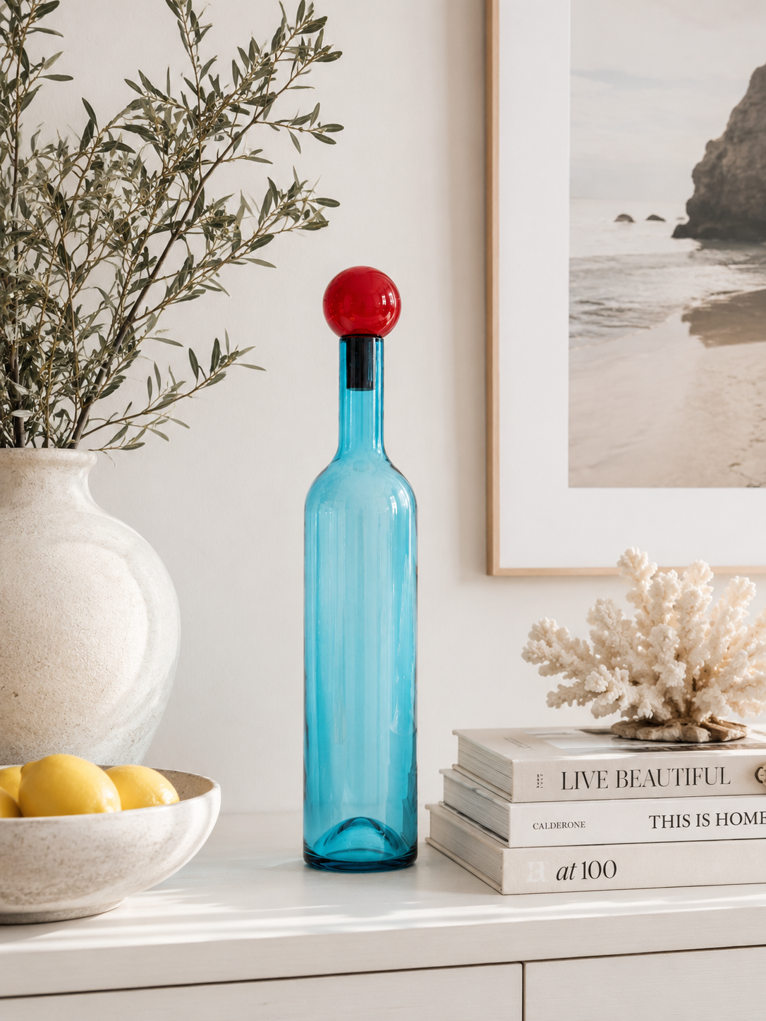 Bottiglia azzurra con tappo rosso h 74x14 cm